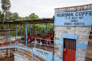 Rurima Coffee washing station with machinery and signboard in Embu, Kenya