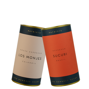 Two cylinders of Patricia espresso roasted coffee. 