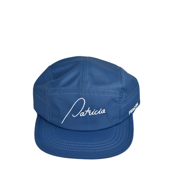 A blue running cap with Patricia embroidered in white on the front panel, and Fractel on the left panel.