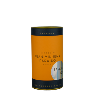 A navy blue cylinder with an orange label describes the roasted coffee beans within. 'PATRICIA' and 'TWO HUNDRED GRAMS' are printed in gold foil. A shiny round sticker reads 'SPECIAL LOT'