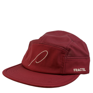 A dark red running cap with the Patricia 'P' embroidered in pink on the front panel, and Fractel on the left panel.
